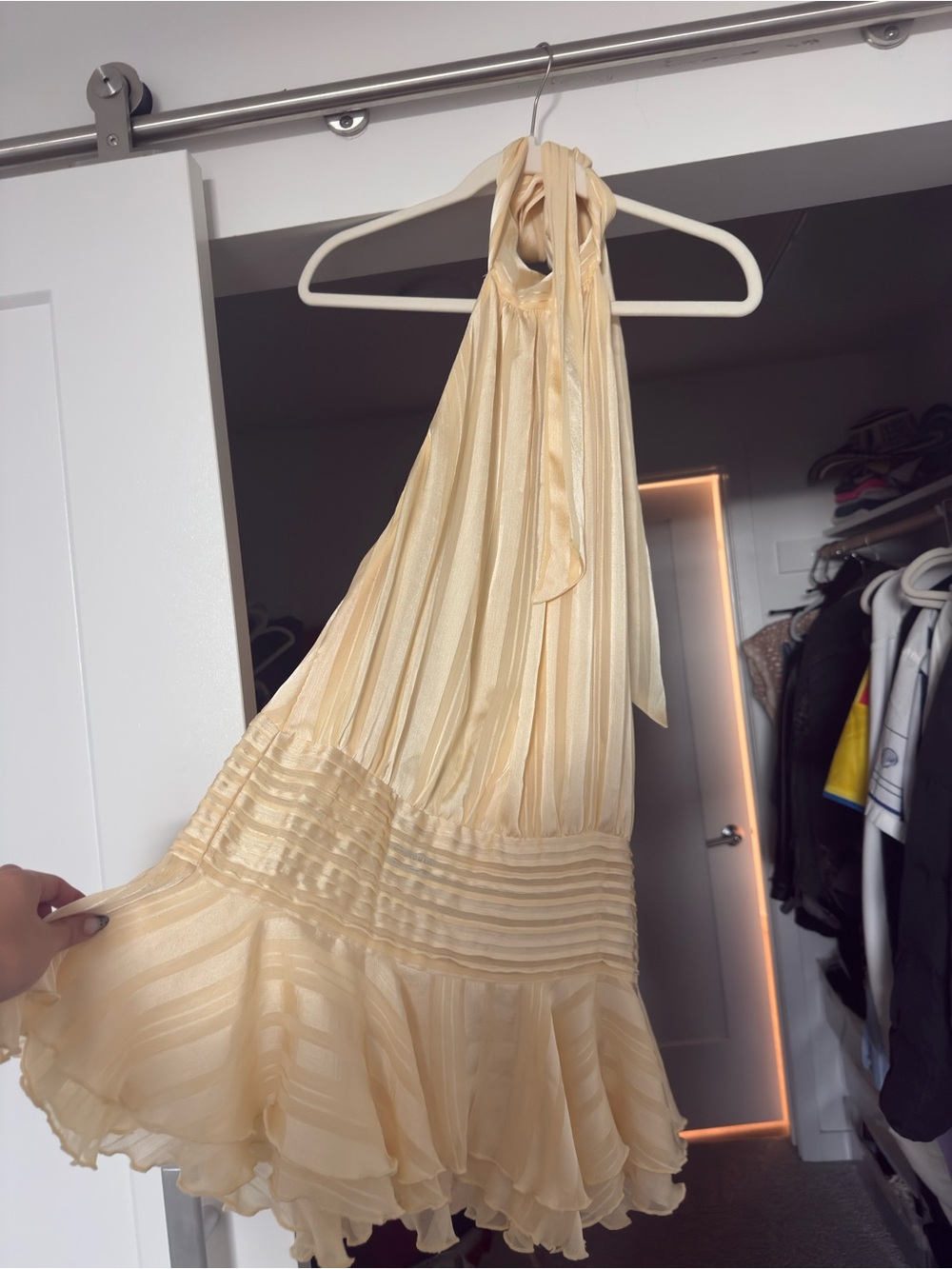 Peppermayo halter top, pleated mini dress in butter yellow